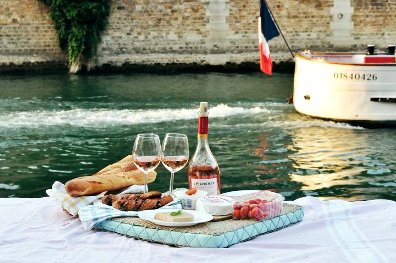 Picnic on the banks of river Seine.