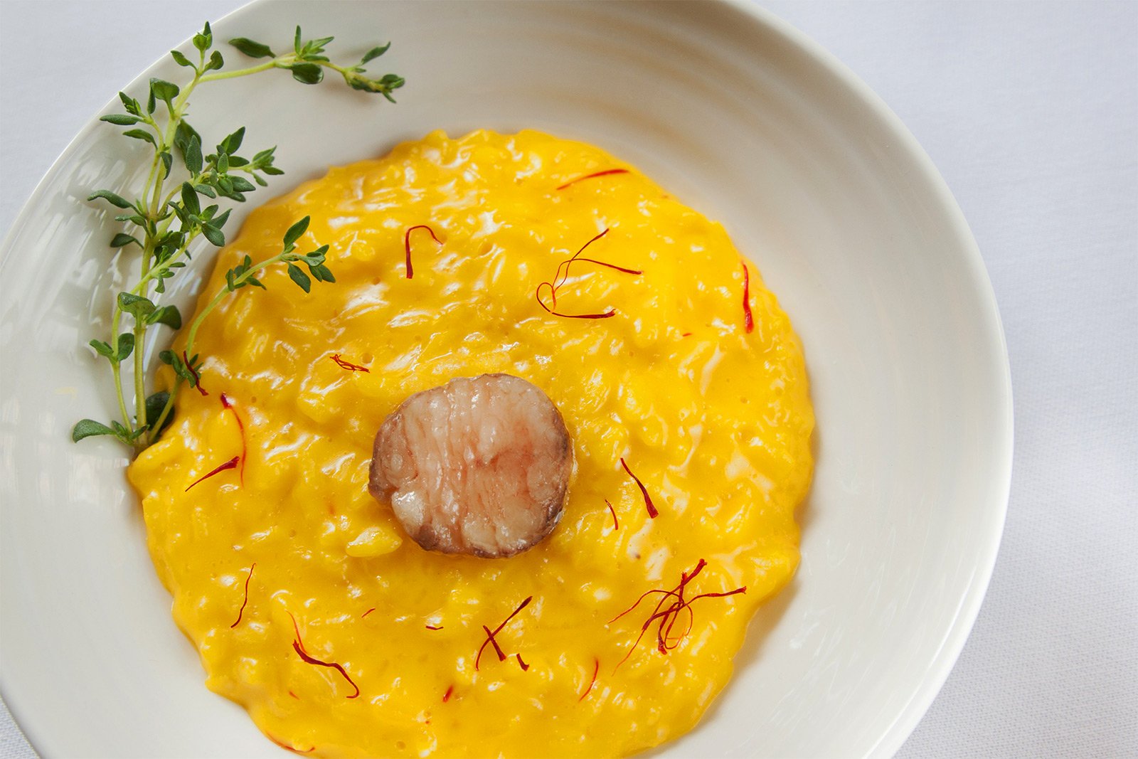 How to try risotto Milanese in Milan