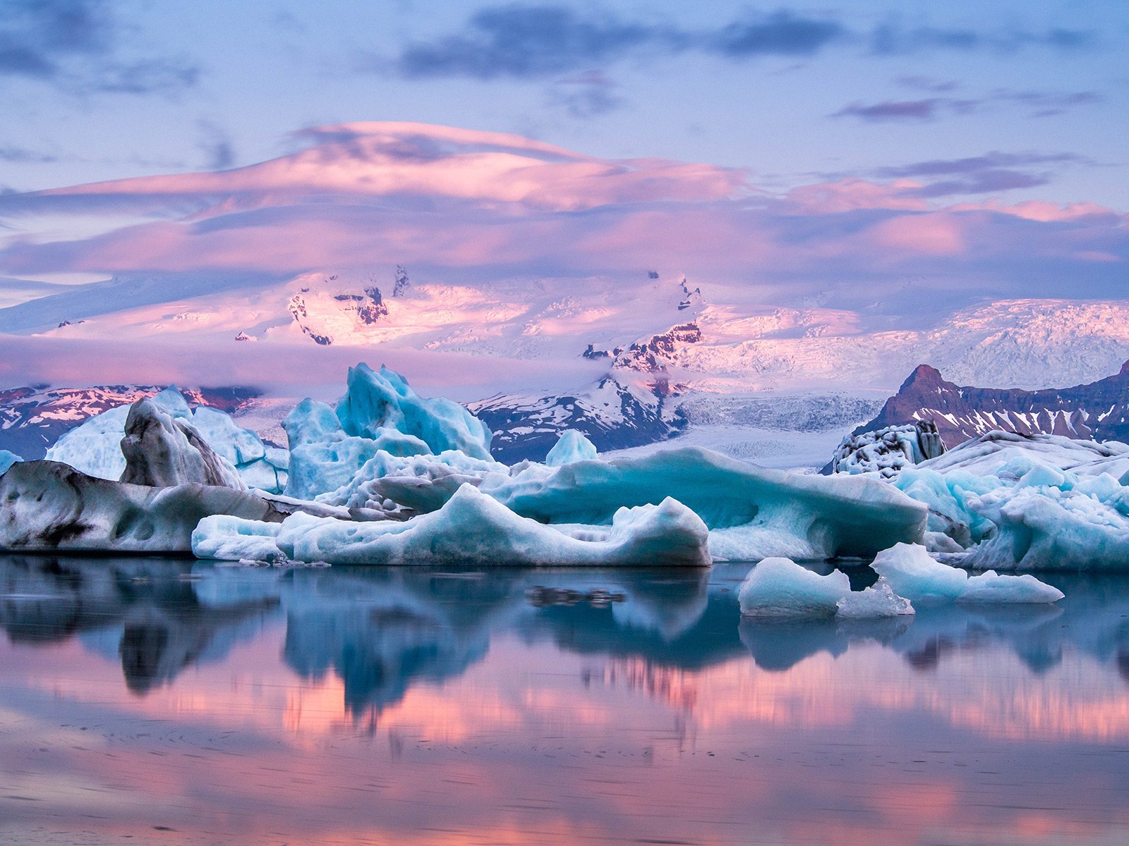 How to see a sunset over floating icebergs in Reykjavik