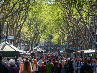Take a walk through La Rambla in Barcelona
