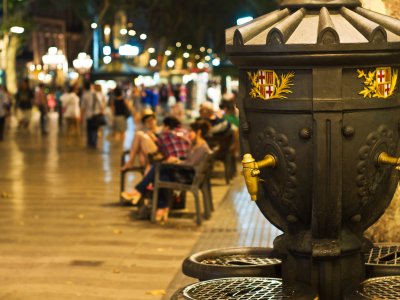 Drink water from a Canaletes fountain in Barcelona