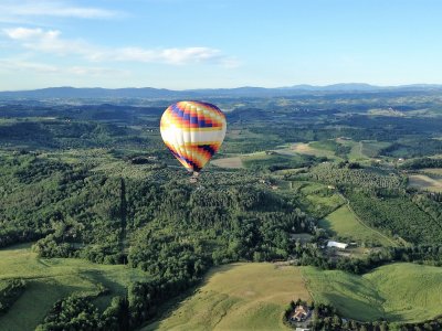 Fly in a hot air balloon over Tuscany in Florence