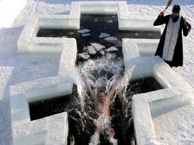Dive in the ice-hole on Baptism in Kiev