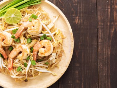 Try Pad Thai noodles in Bangkok