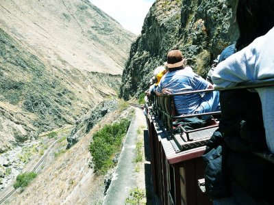 Take a ride through the Andes on a train top in Alausi