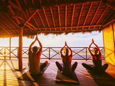 Do yoga at dawn in Bali