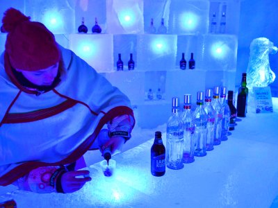 Drink a cocktail in an ice bar in Rovaniemi