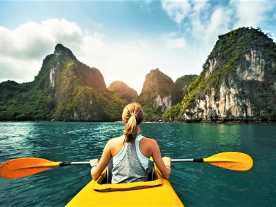 Go kayaking around Ha Long Bay grottoes in Ha Long