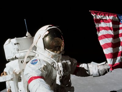 Take a selfie with American flag as a background on the Moon