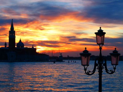 See a sunset on the waterfront in Venice