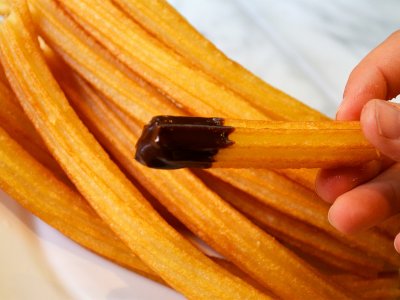 Try churros in Madrid