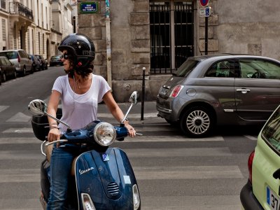 Ride on retro scooter in Paris
