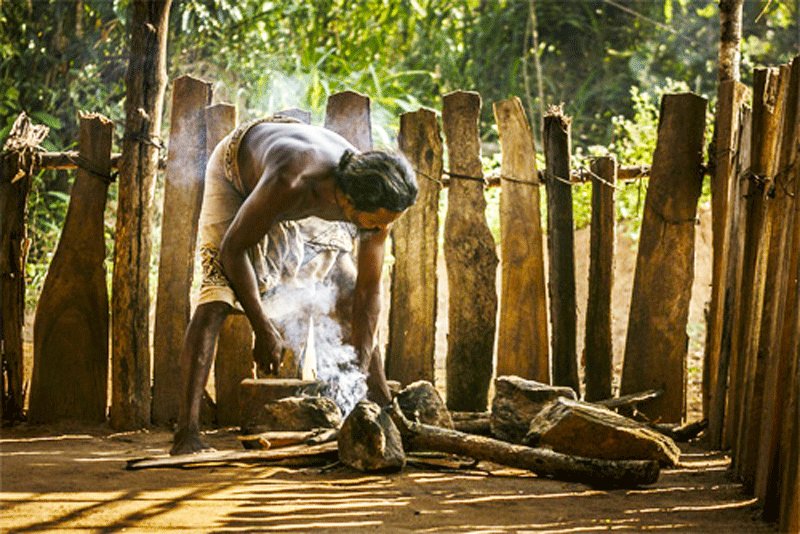 Kindling a fire with stones, Kandy