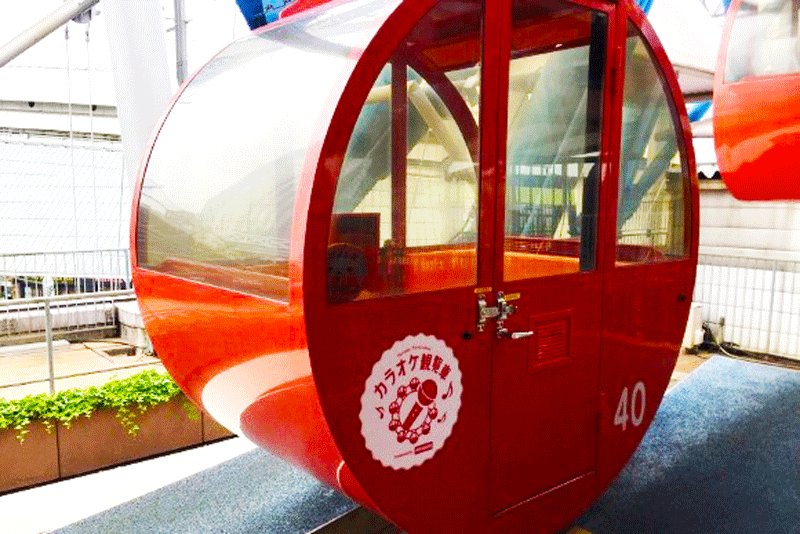 Karaoke cabins are marked with a special sticker, Tokyo