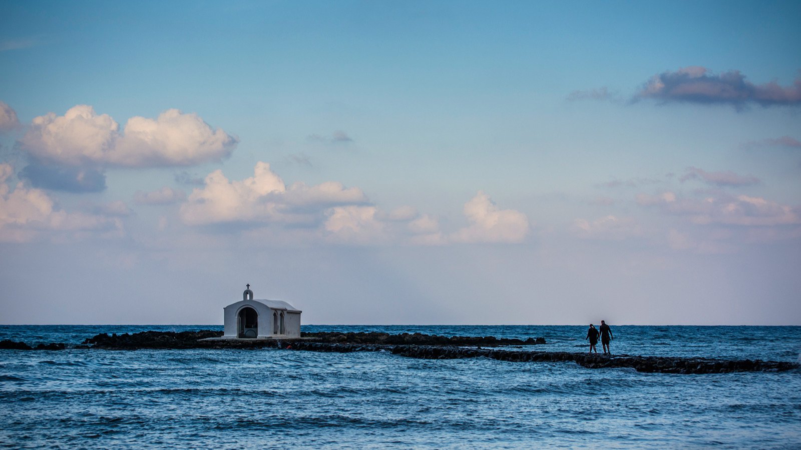 How to take a walk on the spit to the church of St. Nicholas on Crete