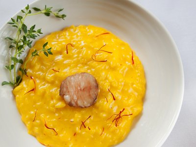 Try risotto Milanese in Milan