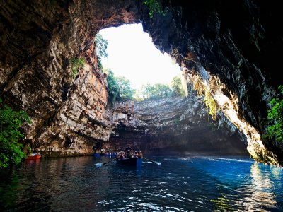 Go boating on the Melissani lake cave in Kefalinia