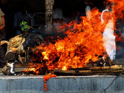 See funeral ceremony on the bank of the Ganges in Varanasi