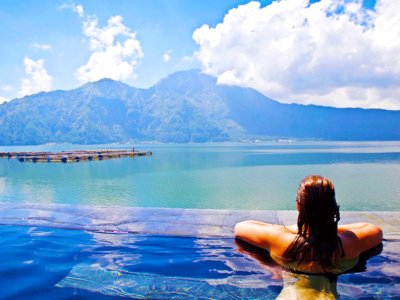 Take a swim in hot springs at the bottom of volcano in Bali