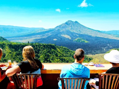 Have diner at the bottom of volcano in Bali