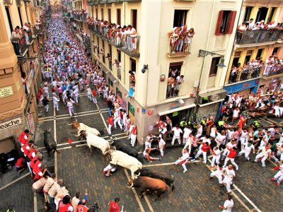 Take part in a bull race in Pamplona