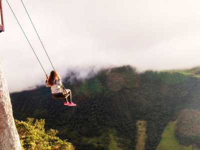 Swing at the edge of the world in Banos
