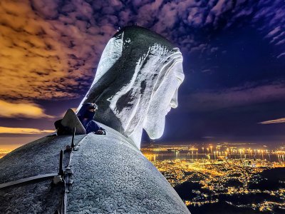 Climb to the top of the statue of Christ the Redeemer in Rio de Janeiro