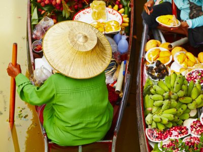 Visit a floating market in Bangkok