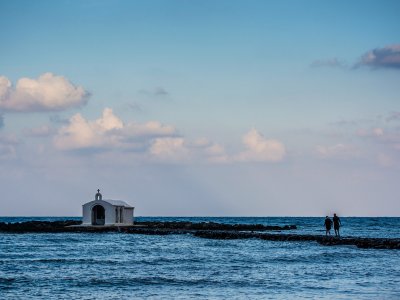 Take a walk on the spit to the church of St. Nicholas on Crete